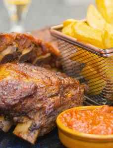 Grilled Rabbit, Chips, and Salad